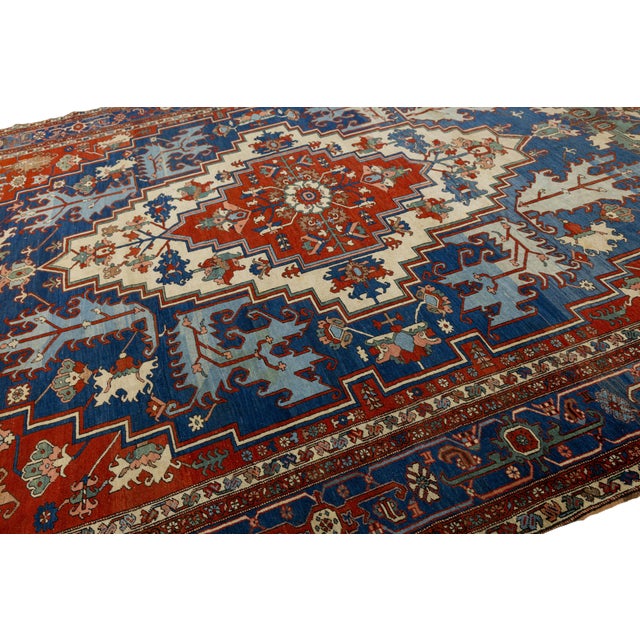 Textile Red Antique Persian Serapi Handmade Wool Rug Featuring a Medallion Design For Sale - Image 7 of 11