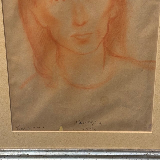 Red chalk drawing on paper by Felice Carena, Face of a Girl, Venice, 1952. Size: 34.50 x 240 mm. Certificate issued by the...