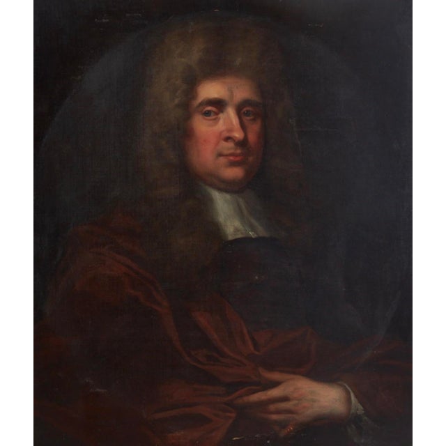 This listing is for an early 18th century French portrait painting. The painting depicts a man with a powdered wig and red...