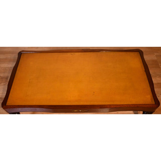 We are pleased to offer this beautiful Regency Style Coffee Table, from the 1930s. This table is made of Mahogany wood ,...