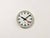 Wall clock produced by TN Telefonbau und Normalzeit in Germany during the 1960s. It features a grey bakelite frame, a...