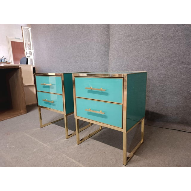 Pair of Azure bedside tables in solid wood and brass edging to bring mid-century modern style and Italian artistry to your...