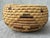 Small round vintage hand woven coil basket. Woven in a geometric pattern in neutral shades. Very nice condition with minor...