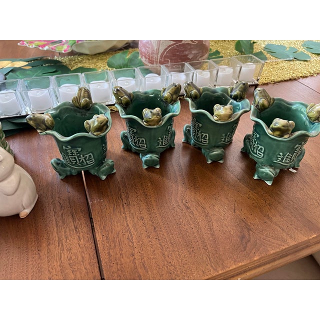 Up for consideration is a beautiful collection of ceramic green frog cups. These would look lovely in your home and they...