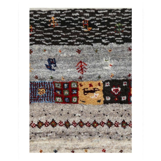 The word “Gabbeh” literally translates to “in the rough,” and it is an accurate description of this style of Persian rug....