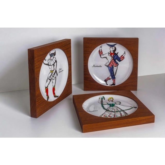 Piero Fornasetti Maschere Italian plates, Set of Three, Made in Italy, c. 1950 Stamped manufacturer's mark to verso of...