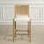 Casual Coastal Inspired Styling With Elevated Details In The Swooped Seat Frame In Solid Wood, Finished In Light Oak...