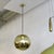 Wonderful ‘1059’ pendant lights by Gunilla Jung for Stockmann-Orno in nickel-plated brass with white opaline shades under...