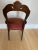 This is an absolutely stunning antique Victorian carved flame mahogany chair. Features gorgeous intricate carvings, saber...