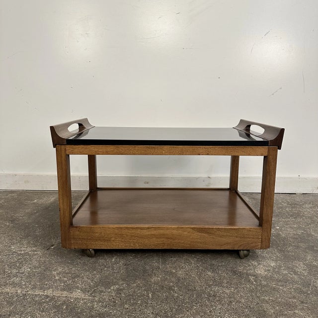 Mid century modern Drexel serving Tray on casters. This multi functional side table has a removable tray with handles and...