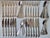 This gorgeous set of 1960's silver-plated flatware is in the 'Alta' pattern and comprises 76 pieces and 12 place-settings...