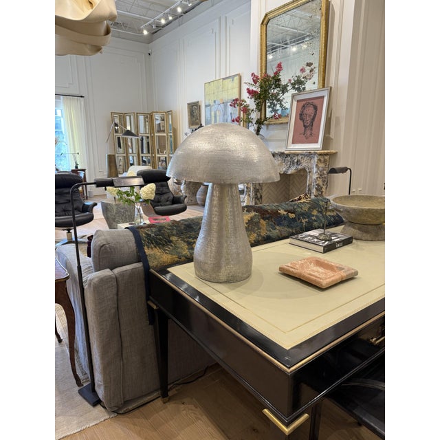 Add a touch of retro charm to your décor with this vintage Mid-Century Modern sculpture. Featuring a sleek metallic finish...