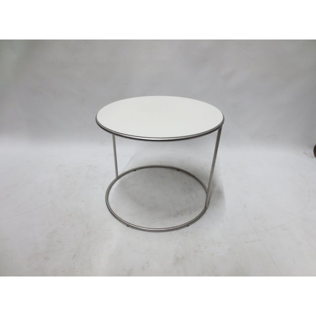 This is the beautiful CANNOT Round Side Table by Cappellini with a matte white top. 21.5" Dia x 17.75" H