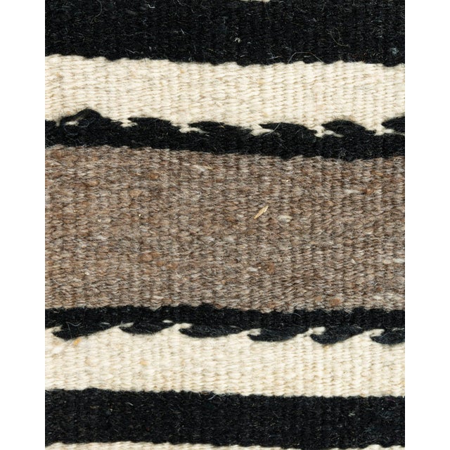 This vintage Turkish flat weave Kilim, hand-woven in the 1950s, combines simplicity with boldness, allowing it to...