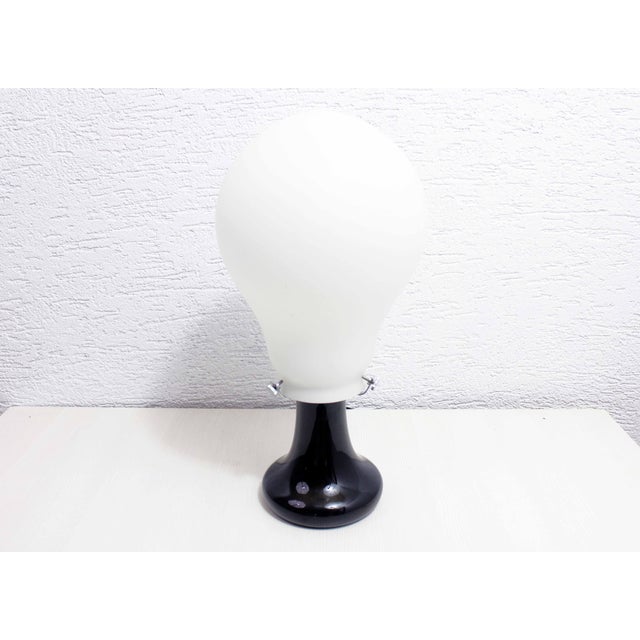 “Bulb” table lamp from the 70s This little mood lamp transports you directly into the atmosphere of the 70s/80s. Whether...