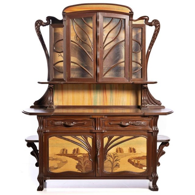 Magnificent Art Nouveau sideboard, signed. French, early 20th century, Mahogany and other woods. Decorated with marquetry,...