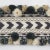 Inspired by traditional Peruvian textiles, Maracana Pom is a dimensional woven trim with playful, multi-colored pom-poms....