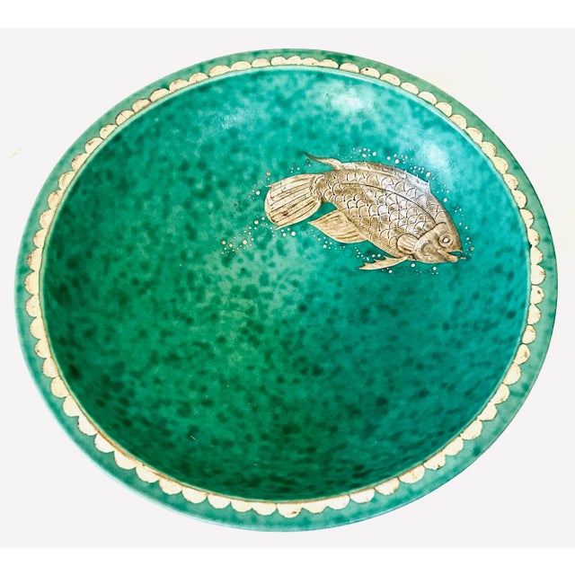 A bowl in ceramic with handmade silver inlay from the 1930s Argenta collection made by Wilhelm Kåge for Gustavsberg. This...