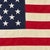 This vintage American flag is made from a cotton cloth with fully sewn stars and stripes. Please note staining and other...
