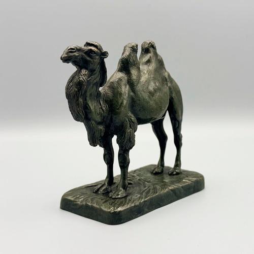 A late 19th century bronze sculpture of a bactrian camel by alfred barye (1839-1895). Excellent deep green patina with...