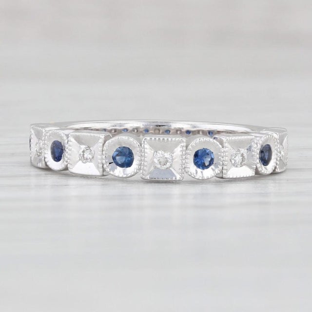 Gemstone Information: - Natural Diamonds - Total Carats - 0.05ctw Cut - Round Brilliant Color - H - I Clarity - VS2 -...