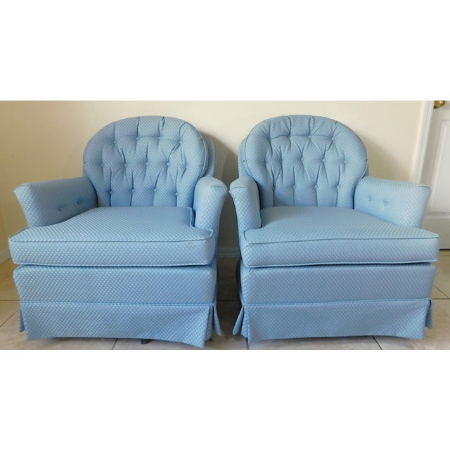 Gorgeous pair of vintage blue tufted and upholstered swivel rocker lounge chairs. Great set! Made in the USA. Solid and...