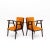 Pair of armchairs with dark stained wooden frames and upholstered seats. The arm chairs have been reupholstered in an...