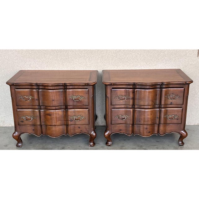 Wonderful pair of late 19th century Italian chests or commodinis made of burled walnut in the Baroque Venetian style. Each...