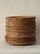 Set of twenty-two hand-woven natural wicker or rattan charger plates. Light honey-golden tone; tight weave throughout....