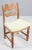 A striking dining chair by Henning Kjærnulf, made of oak and ready for you to upholster Refreshing design with bold...