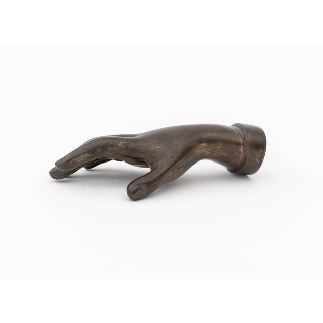 Victorian Patinated Bronze Model of a Hand. 1.25" H x 4.25" W x 2.25" D. Provenance: From a 500 Park Avenue Estate.