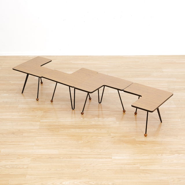 Mid-century set of four side tables from the 1960s. These wonderful little set of four tables can be configured in a...