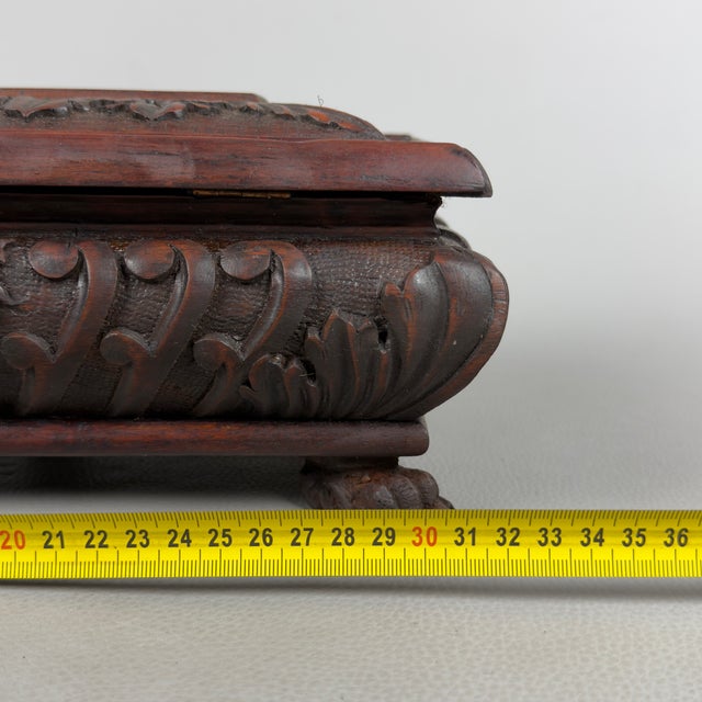 Antique Carved Wooden Chest with Mythological Creatures and Lion Feet, 20th Century For Sale - Image 13 of 14