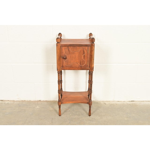 A beautiful antique Arts & Crafts or Late Victorian smoker's stand In the manner of Stickley Brothers USA, Early 20th...