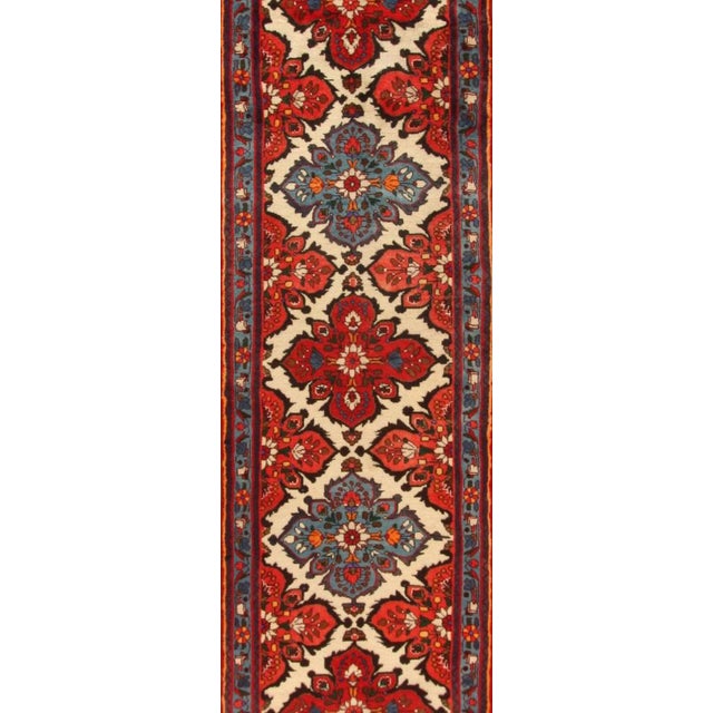 Genuine hand-knotted Middle Eastern rug runner | Size: 400 cm x 85 cm | Knot density: approx. 250.000 knots/m² | Material:...