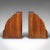 This is a pair of executive desk bookends. An English, solid mahogany and leather dressed book rest, dating to the...