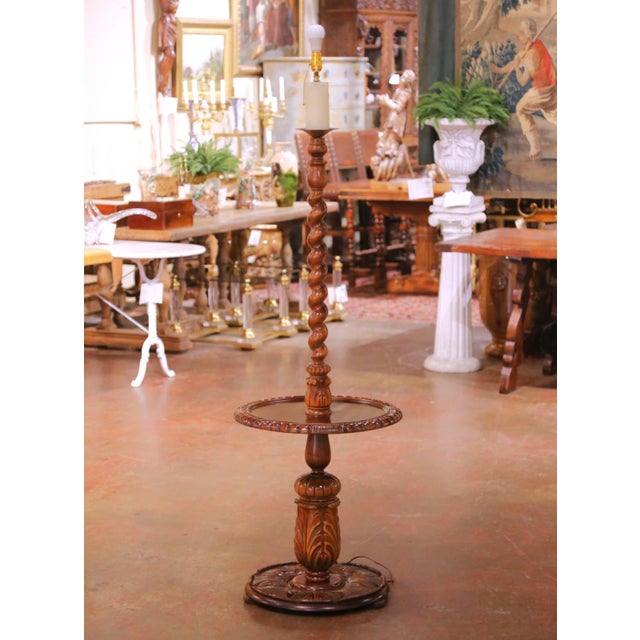 Place this elegant antique floor lamp beside a reading chair, in a study, or anchoring a living room corner. Crafted in...
