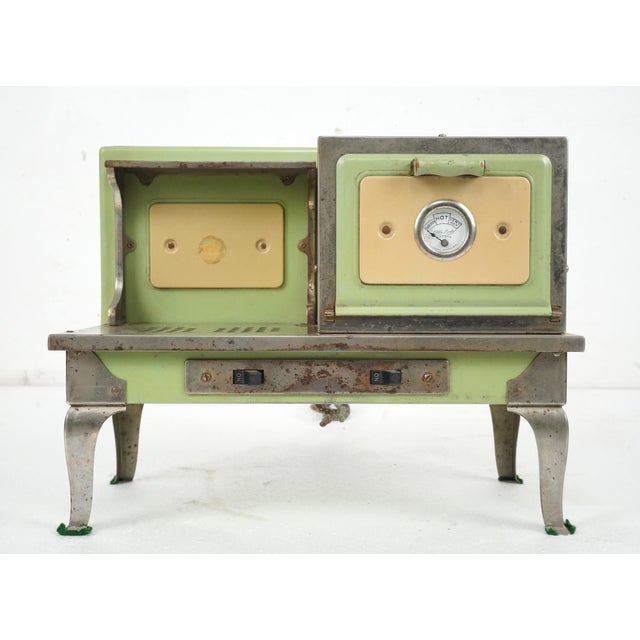 Vintage 1930s "Little Lady" electric toy stove. Manufactured in Kokomo, Indiana, by companies like Kingston Products. This...