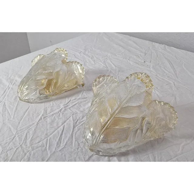 Pair of Murano glass appliques, transparent color shaded in gold. Dimensions (lxh) 30 x 27 cm European Plug (up to...