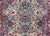 A beautiful early 20th century Persian Kirman rug with an all-over mirrored densely woven floral pattern with myriad...