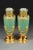 An important pair of baluster vases in jade-coloured opaline with gilt brass mountings, the shoulders decorated with...