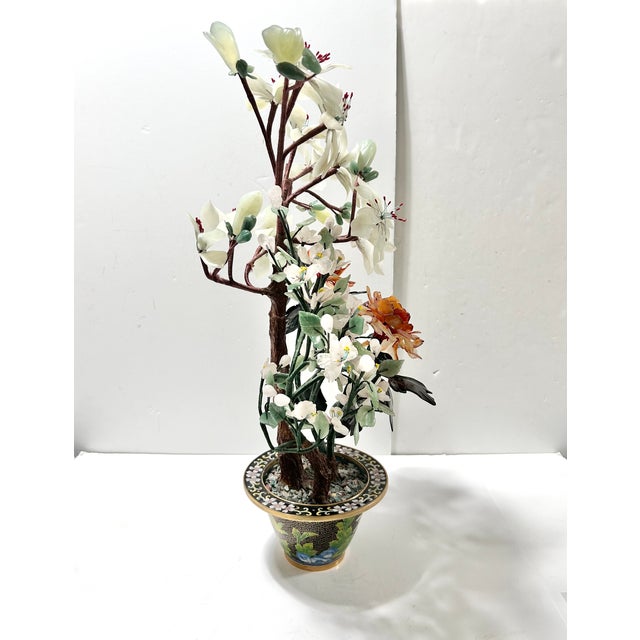 A substantial vintage Chinese hardstone bonsai tree composed of individually carved stone blossoms, leaves and fruit...
