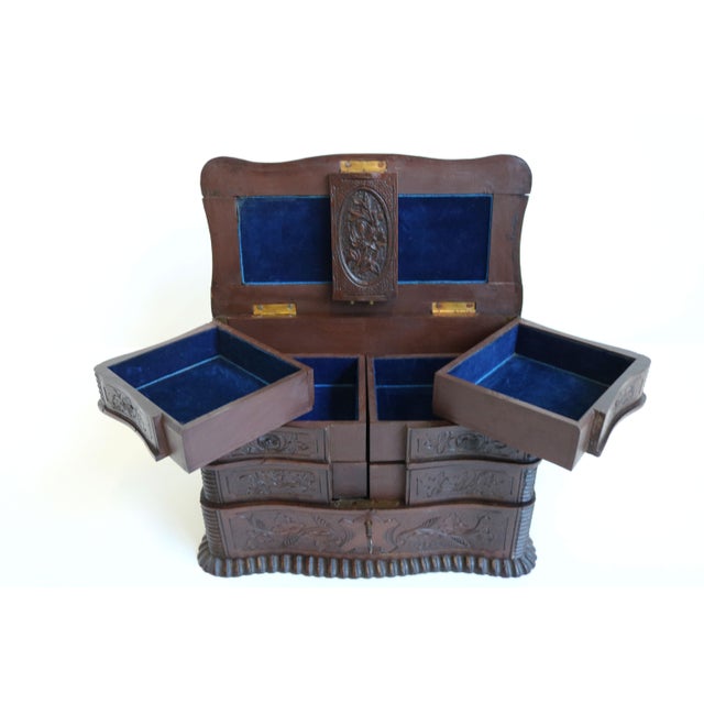A beautiful, very finely carved antique black forest jewelry box from the late 19th/ early 20th century made in...