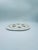 A vintage-style cake stand, crafted from high-quality ecru ceramic. The round stand, with two integrated, contoured...