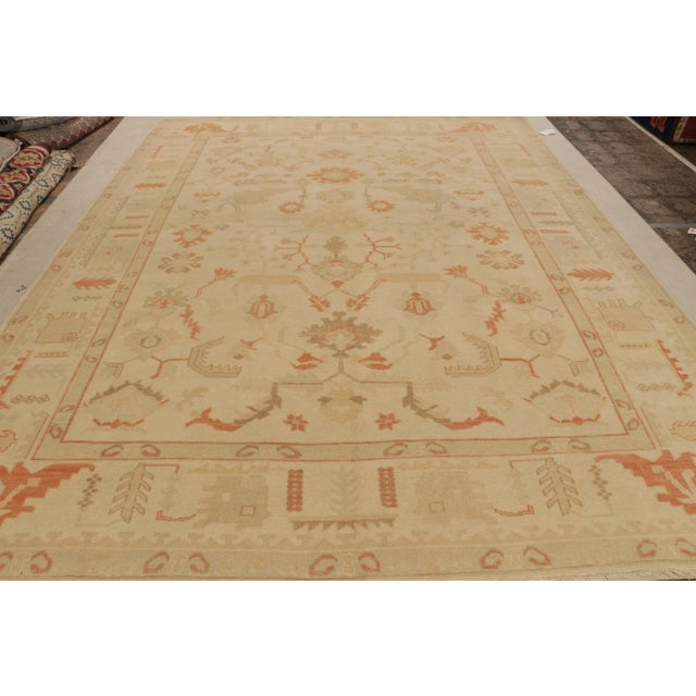 A scintillating 9x12 vintage mid-century Oushak rug hailing from Turkey circa 1950-1960, joining Rug & Kilim’s Antique &...
