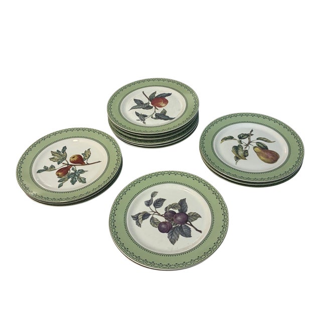 A distinguished set of 14 porcelain dinner plates by Andrea by Sadek, produced as an authorized Winterthur Museum...