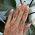 Nine earth-mined diamonds totalling 0.99 carats sparkle across this substantial solid 14K white gold estate band. The...