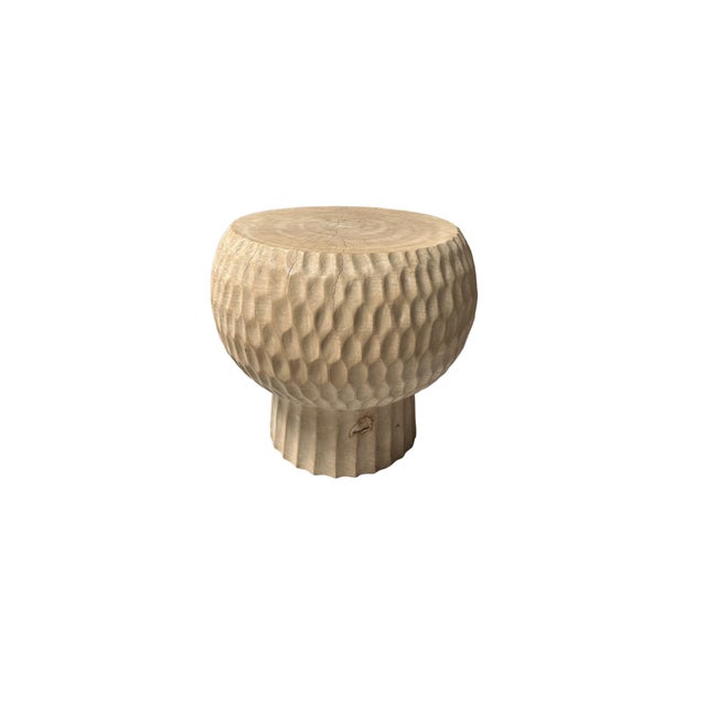 Introducing our exquisite round side table, expertly crafted from rich mango wood. This stunning piece features intricate...