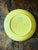 A wonderful small vintage Italian bowl by Società Ceramica Italiana (S.C.I.) of Laveno, featuring a cheerful yellow ground...