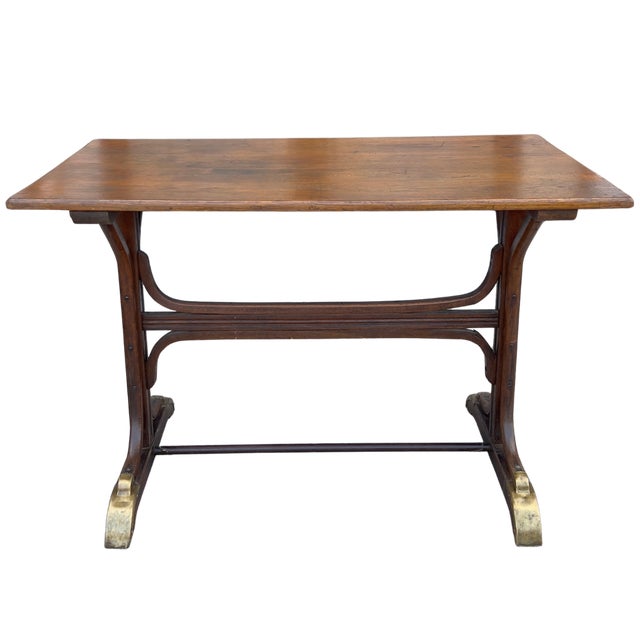 An elegant early 20th-century French bentwood bistro table in the Thonet style, sourced in Provence, France. Dating to the...
